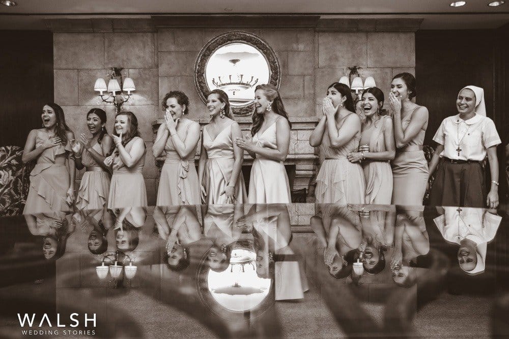 bridesmaids taking a first look at the bride in houtson