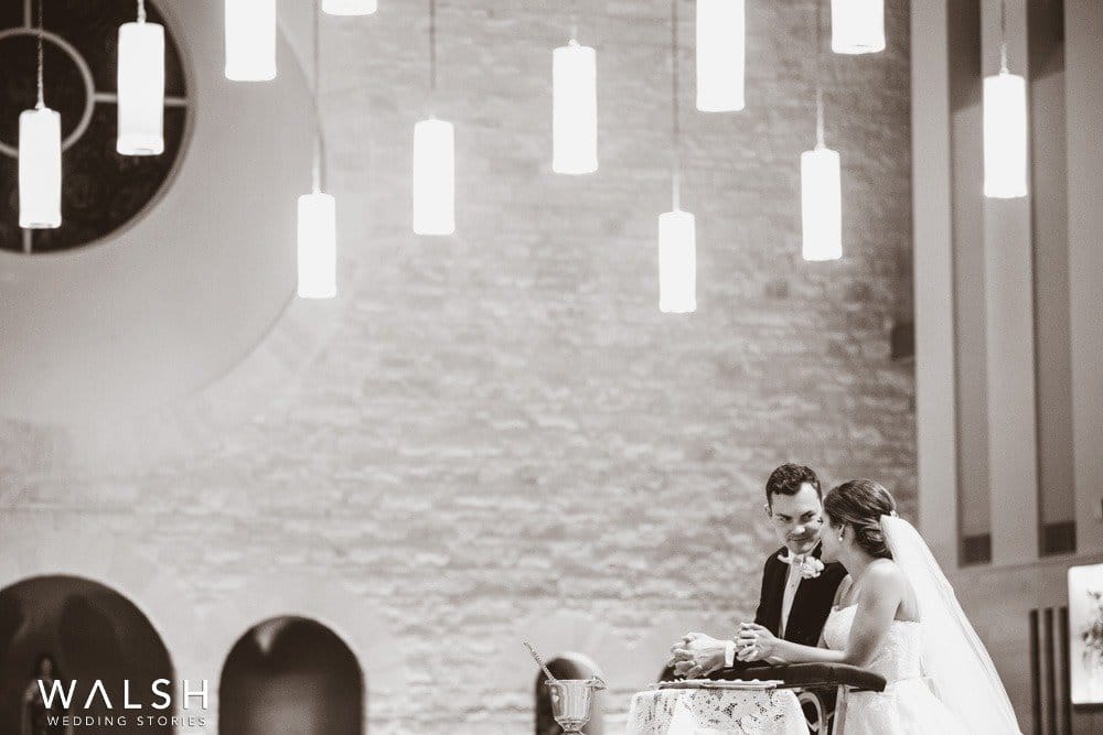 bride and groom getting married in church