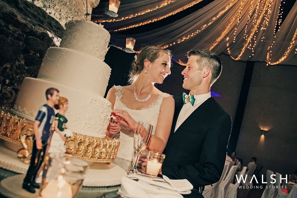 wedding photographers casa santo domingo antigua guatemala- cutting of the cake